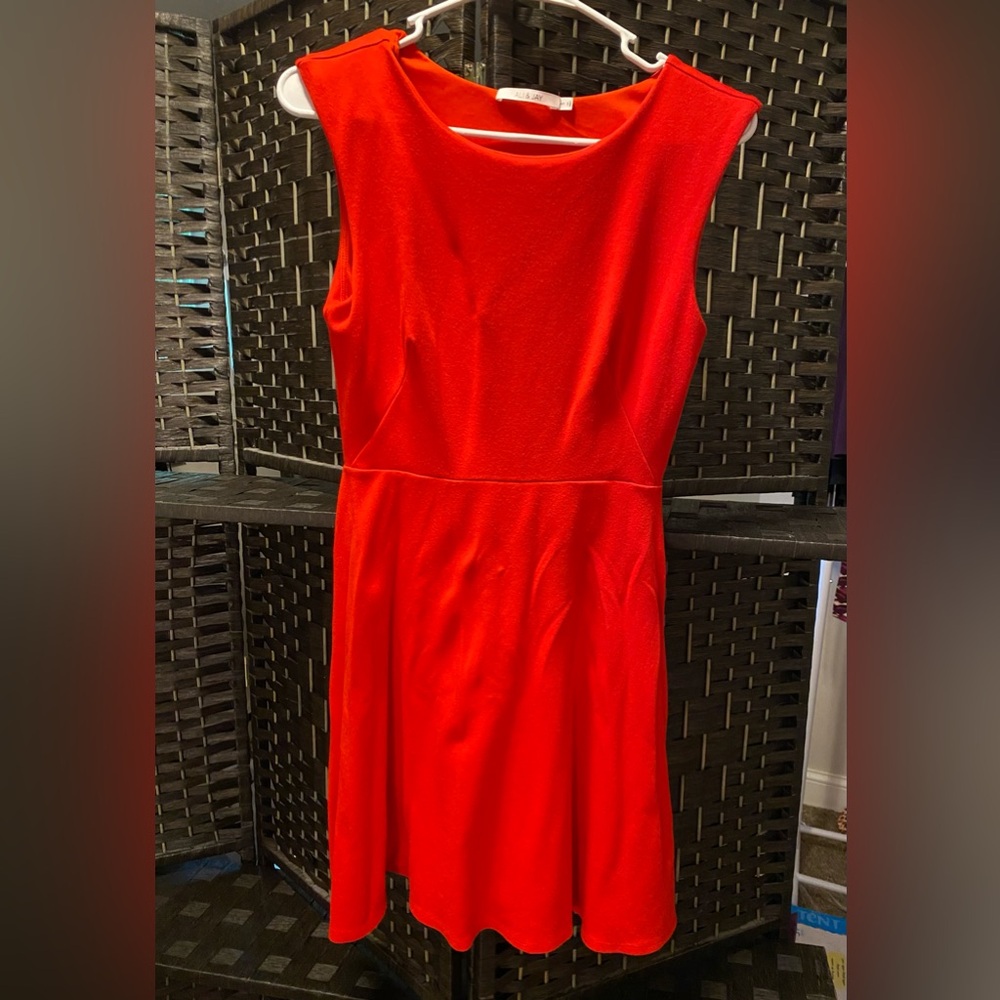 A real statement dress! Bright red Aly & Jay dress. Great condition.